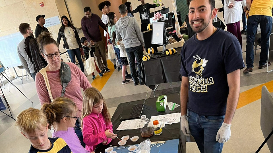 Kids at a table coloring